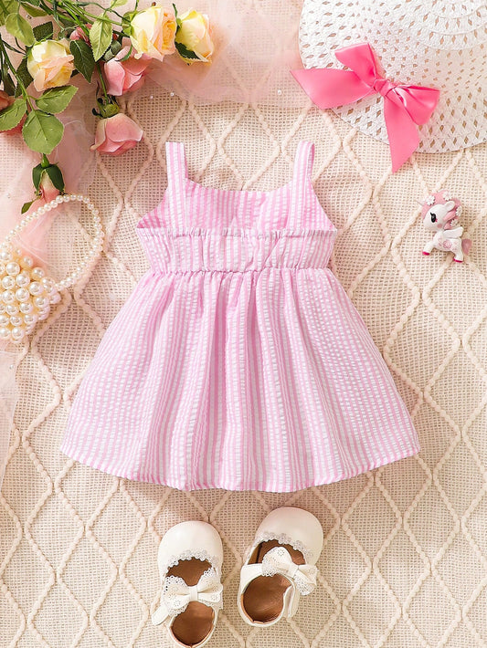 Prenda rosa vestido a rayas para bebe con espalda elástica vista trasera