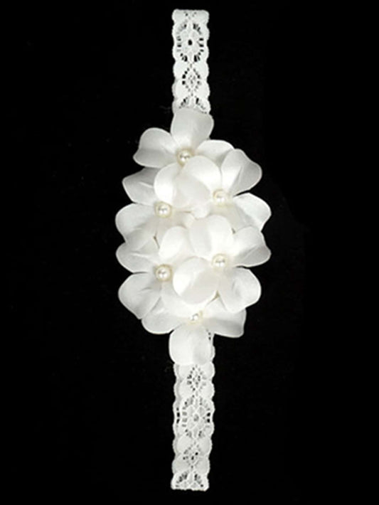 Prenda blanca diadema para bebe con flores y perlas detalle