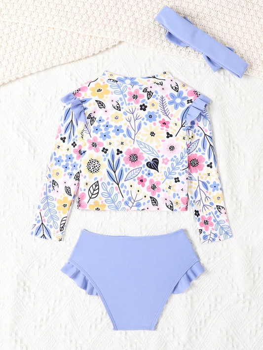 Conjunto floral lila con volantes delicados