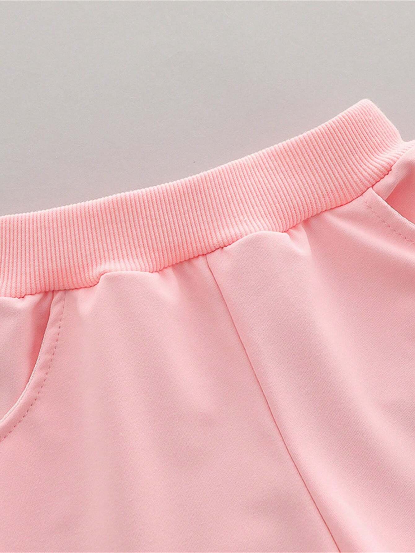 Prenda rosa pantalón para bebe con detalle de cintura elástica y bolsillo