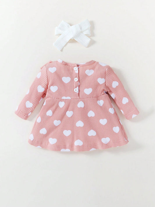 Vestido rosa corazones con lazo dulce acanalado