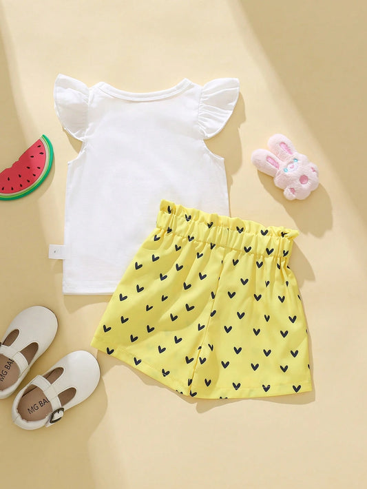 Conjunto amarillo dulce con estampado de gato