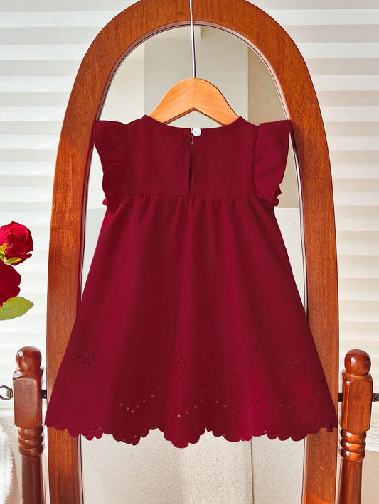 Prenda burdeos vestido para bebe con lazo y volantes vista trasera