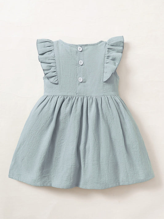 Vestido Neblina azul con volantes y bordado