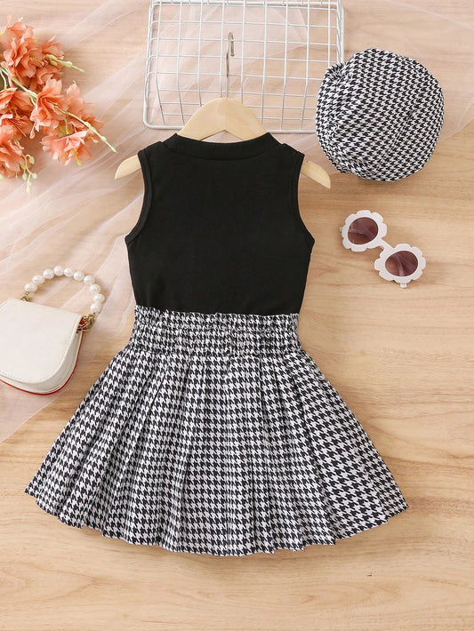 Prenda negro conjunto para bebe con falda blanco y negro diseño elegante vista completa