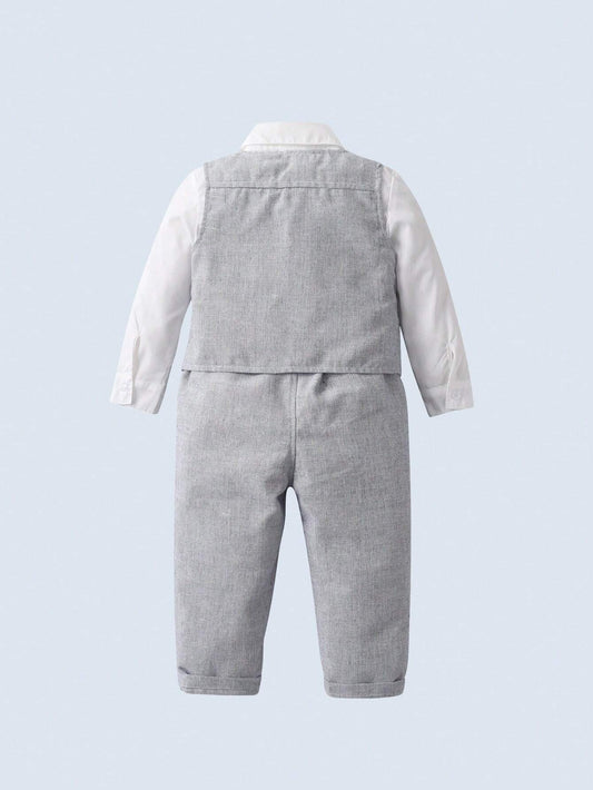 Conjunto formal gris para bebé con chaleco y pantalón, vista posterior.