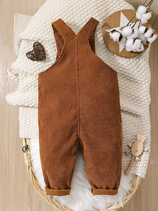 Prenda marrón overol para bebe vista trasera con tirantes cruzados