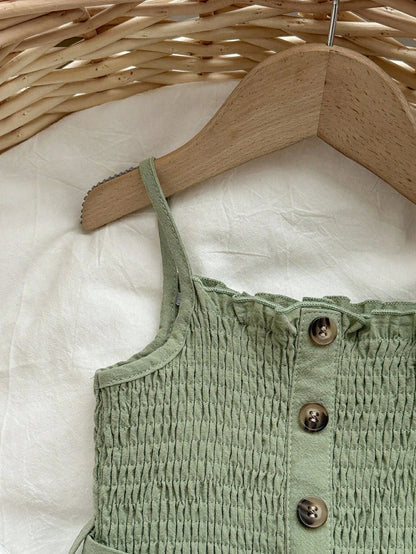 Enterizo verde menta con tirantes y cinturón para bebé niña