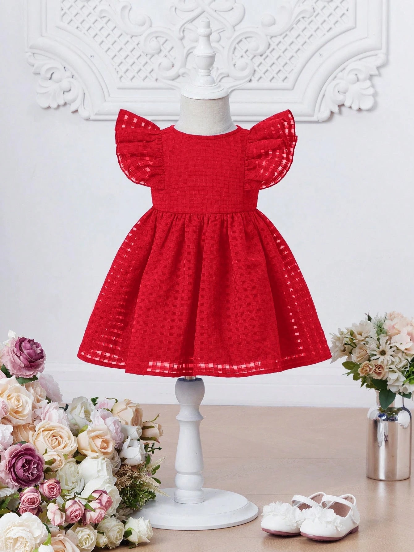 Prenda rojo vestido elegante para bebe con volantes vista frontal
