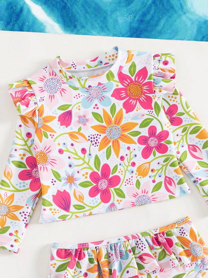Prenda multicolor traje de baño floral para bebe detalle superior