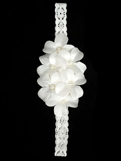Prenda blanca diadema para bebe con flores y perlas detalle
