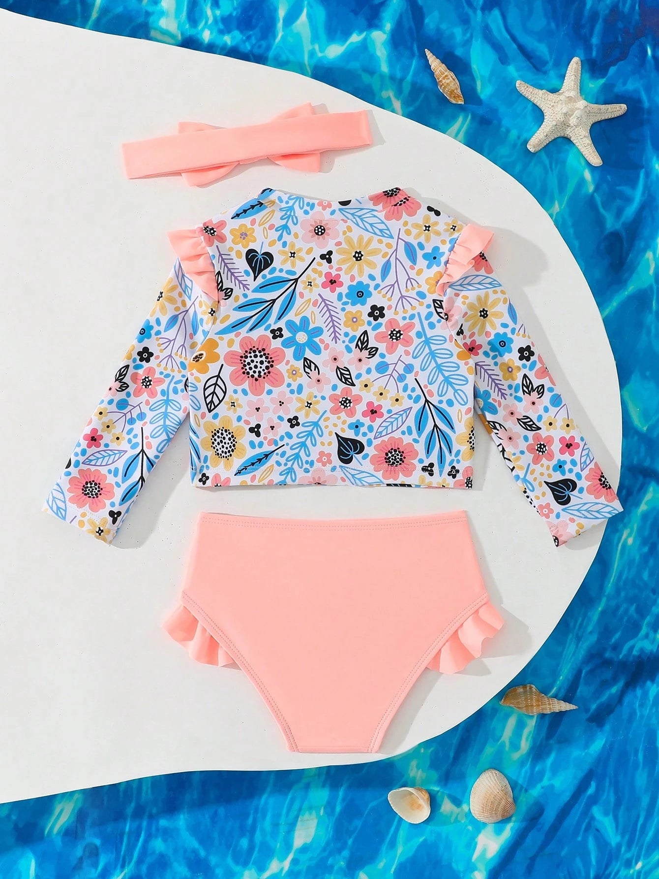 Prenda albaricoque traje de baño floral para bebe vista trasera