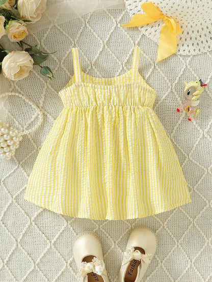 Prenda amarilla vestido a rayas para bebe con espalda elástica vista trasera