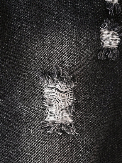 Prenda negro jeans para bebe detalle de desgarro