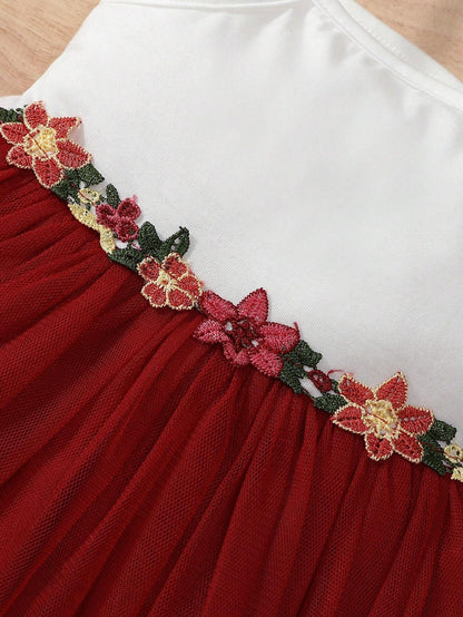 Prenda burdeos vestido de tul para bebe con flores bordadas en la cintura