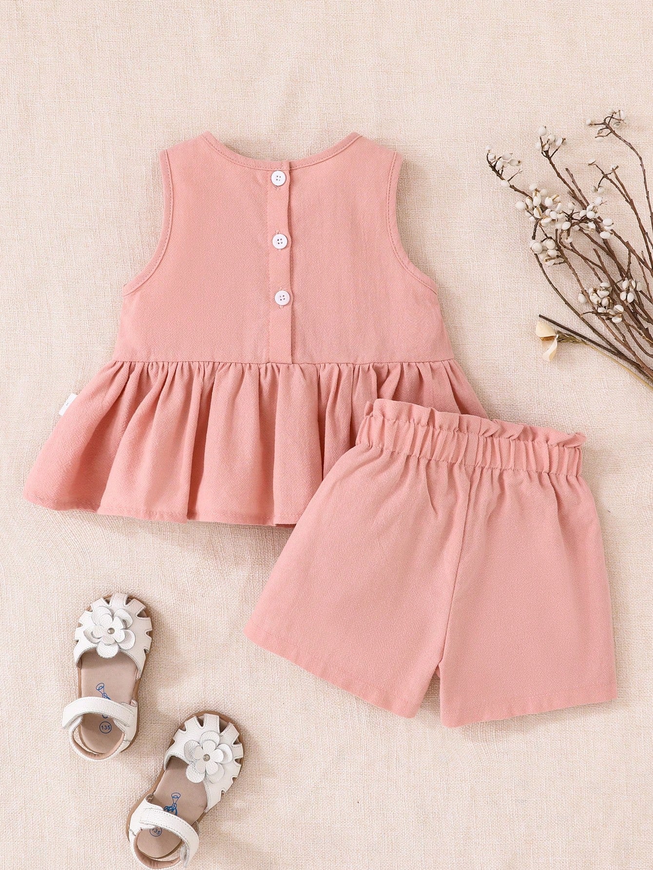 Conjunto rosa elegante con lazo para bebé niña