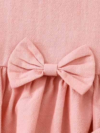 Conjunto rosa elegante con lazo para bebé niña