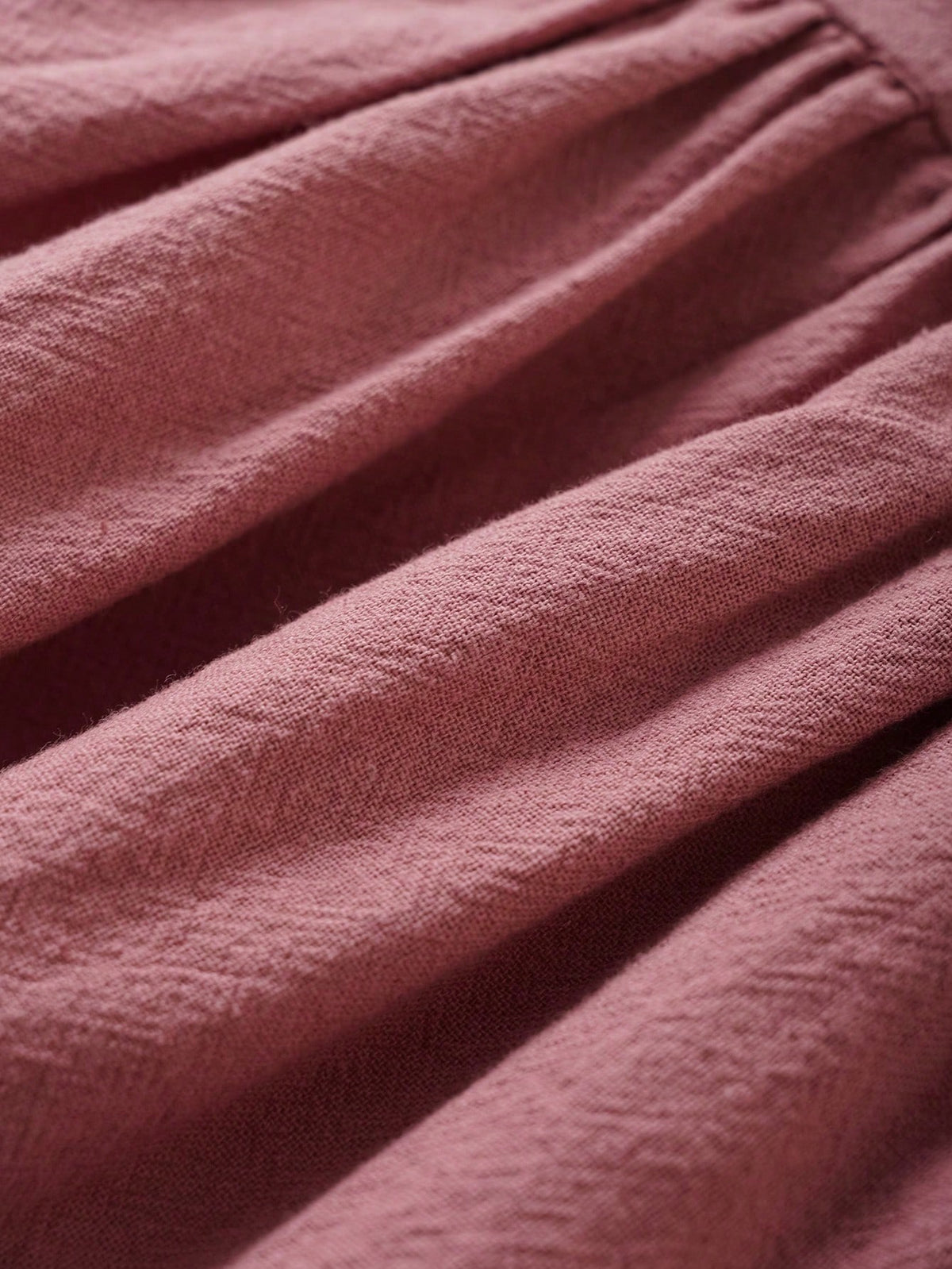 Prenda rosa conjunto para bebe detalle de textura de algodón