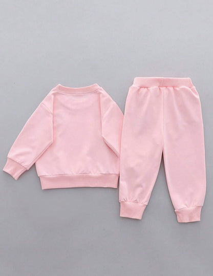 Prenda rosa conjunto para bebe con sudadera y pantalón vista posterior