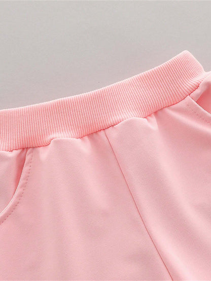 Prenda rosa pantalón para bebe con detalle de cintura elástica y bolsillo
