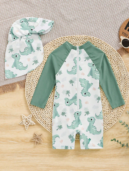 Prenda verde menta traje de baño para bebe con dinosaurios y gorro vista frontal