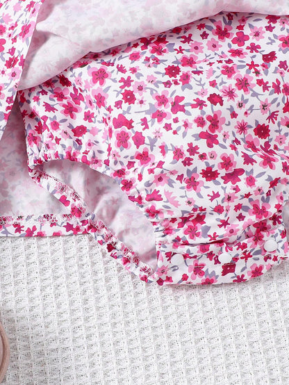 Prenda rosa vestido para bebe detalle de tela floral