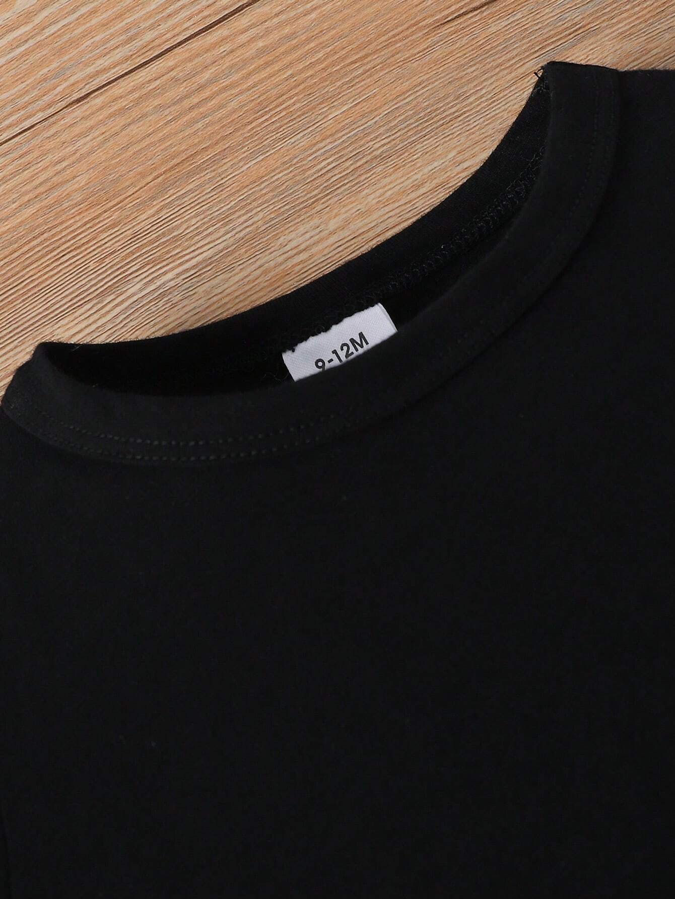 Camiseta shorts letras negro estilo urbano cómodo