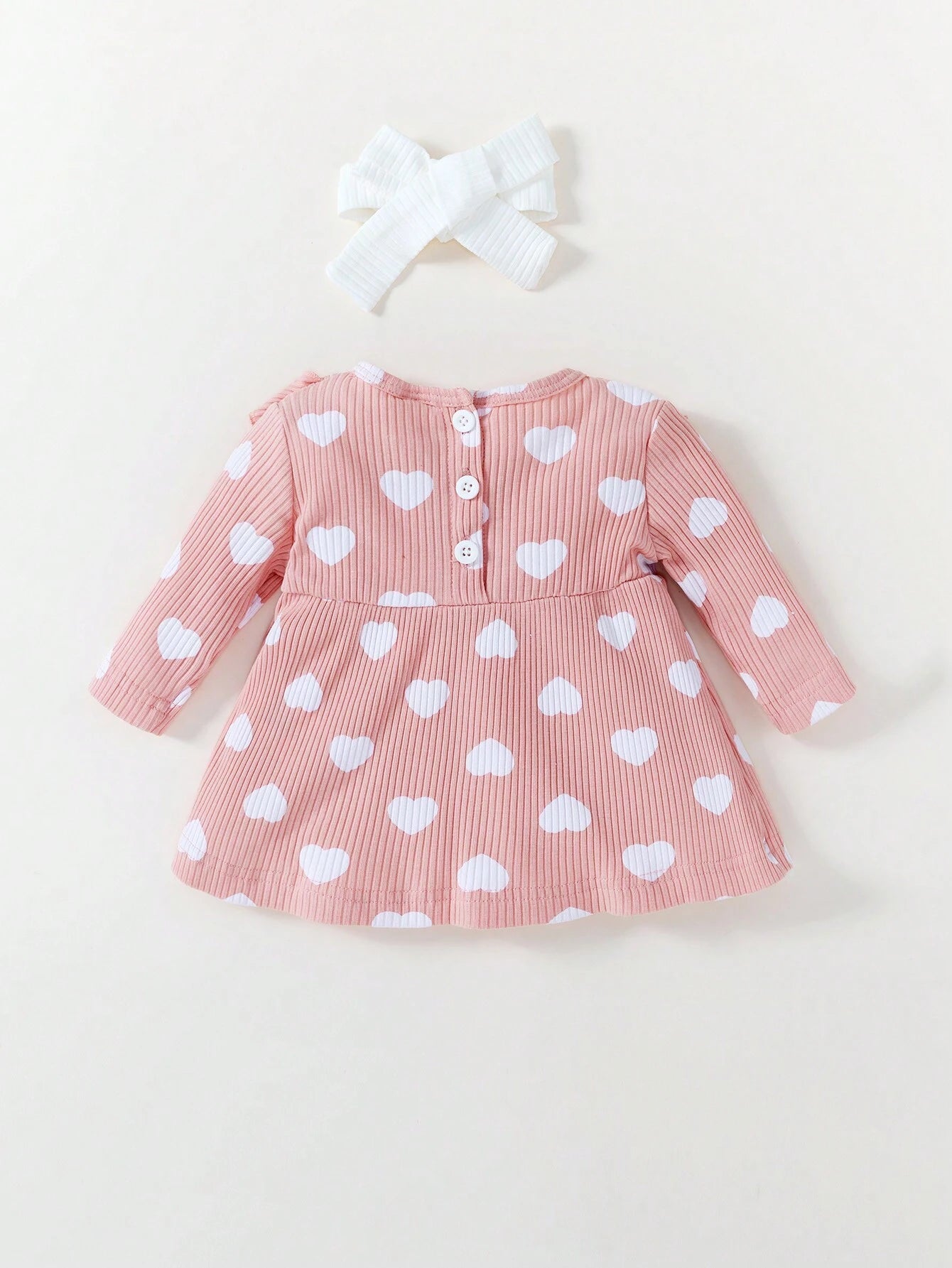 Vestido rosa corazones con lazo dulce acanalado