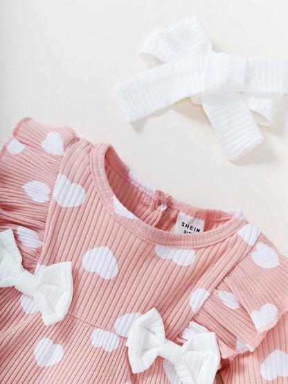 Vestido rosa corazones con lazo dulce acanalado