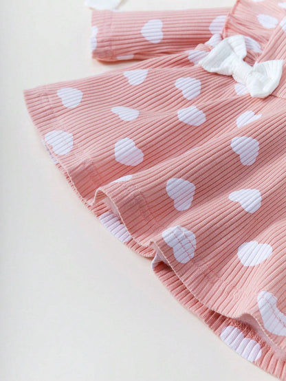 Vestido rosa corazones con lazo dulce acanalado