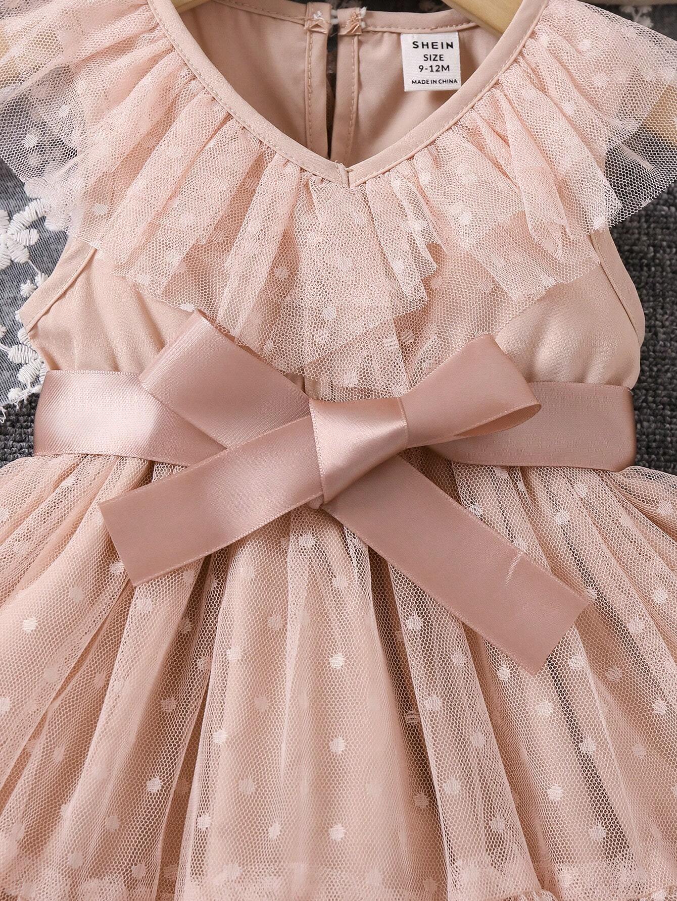 Prenda albaricoque vestido para bebe con detalle de lazo satinado y tul con lunares