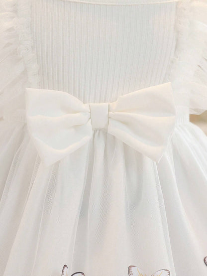 Prenda blanco vestido para bebe detalle de lazo frontal
