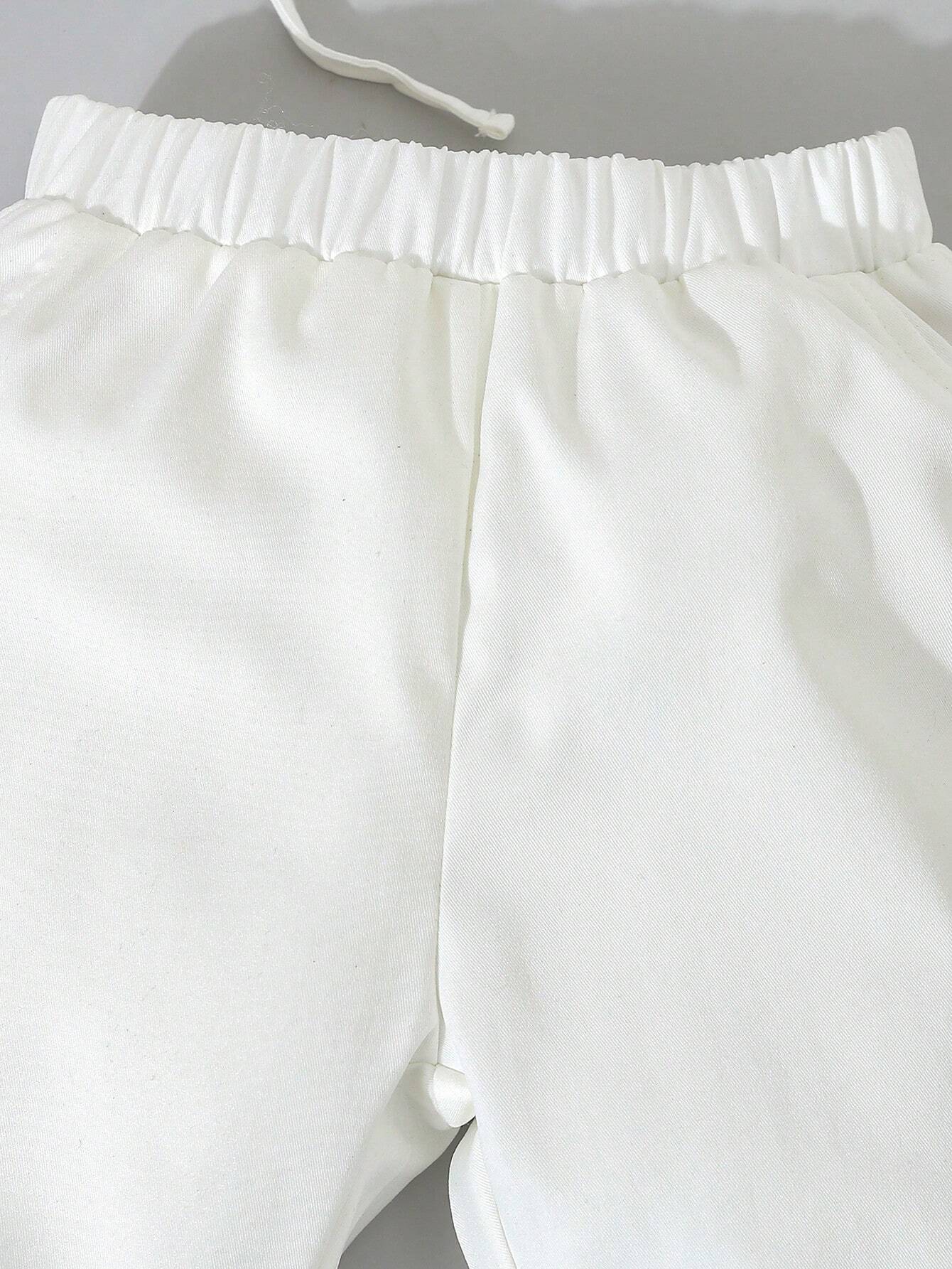 Conjunto blanco elegante para bautizo con moño