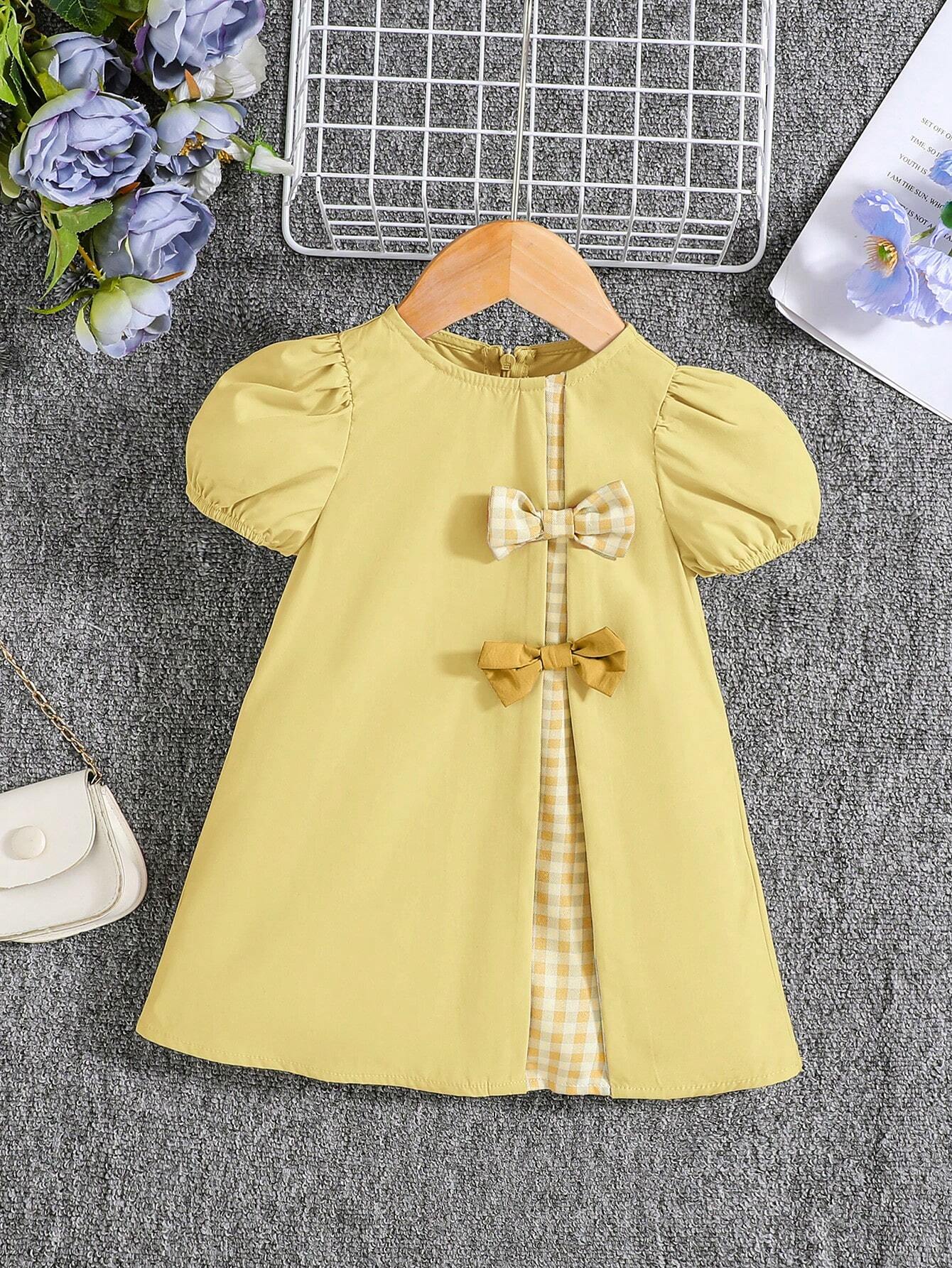 Vestido amarillo con lazos y manga farol
