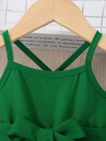 Prenda verde vestido para bebe detalle de tirantes
