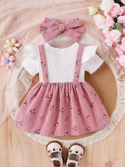 Prenda rosa conjunto para bebe con falda floral y tirantes vista trasera