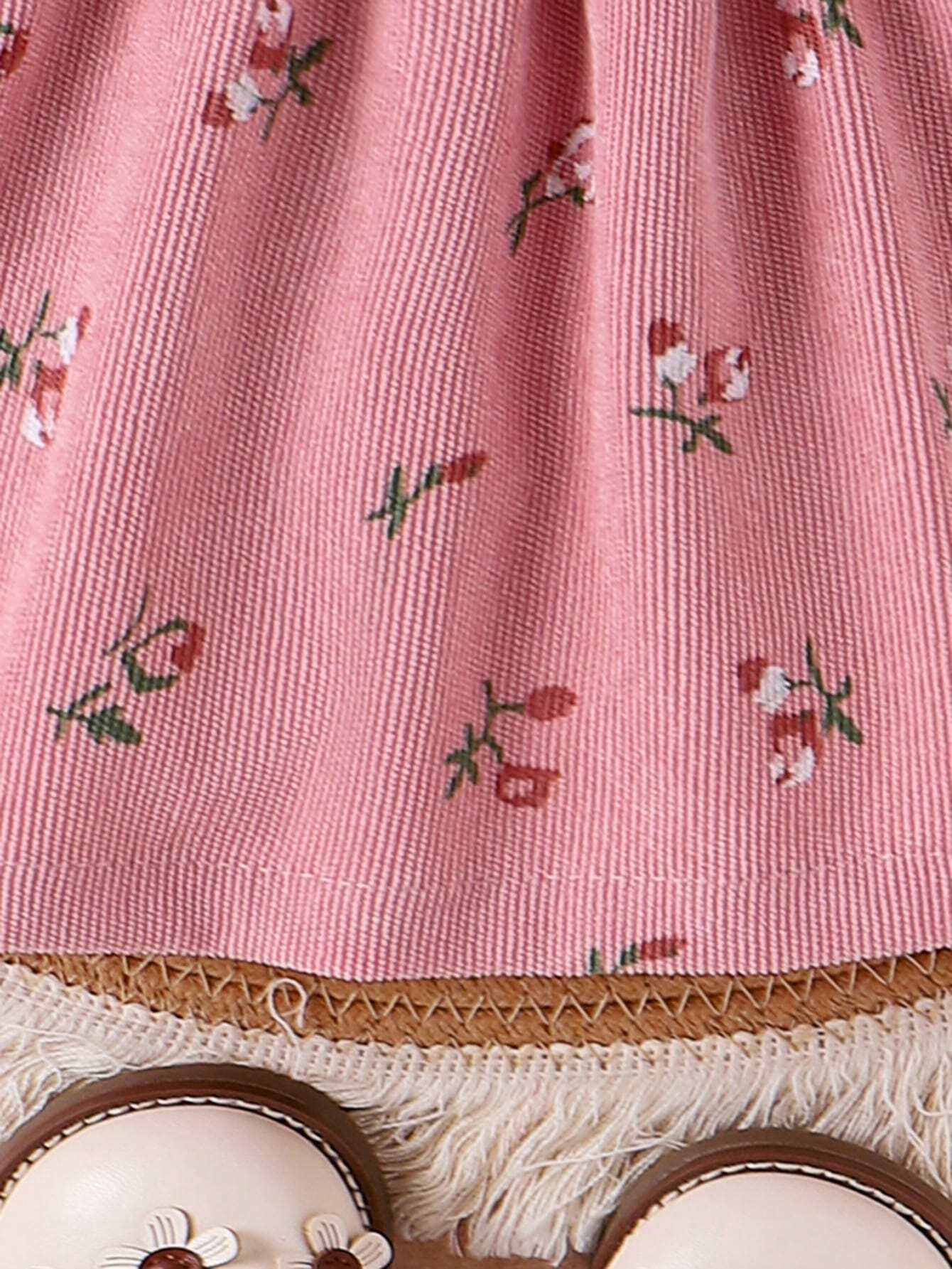 Prenda rosa conjunto para bebe con detalle de estampado floral