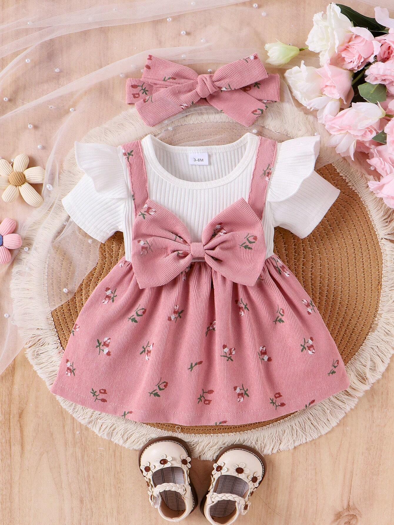 Prenda rosa conjunto para bebe con lazo floral y diadema vista frontal