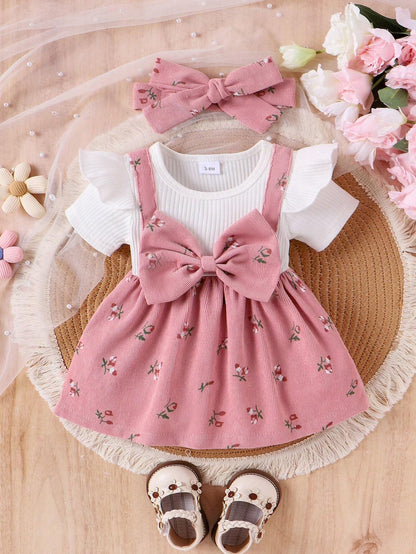 Prenda rosa conjunto para bebe con lazo floral y diadema vista frontal