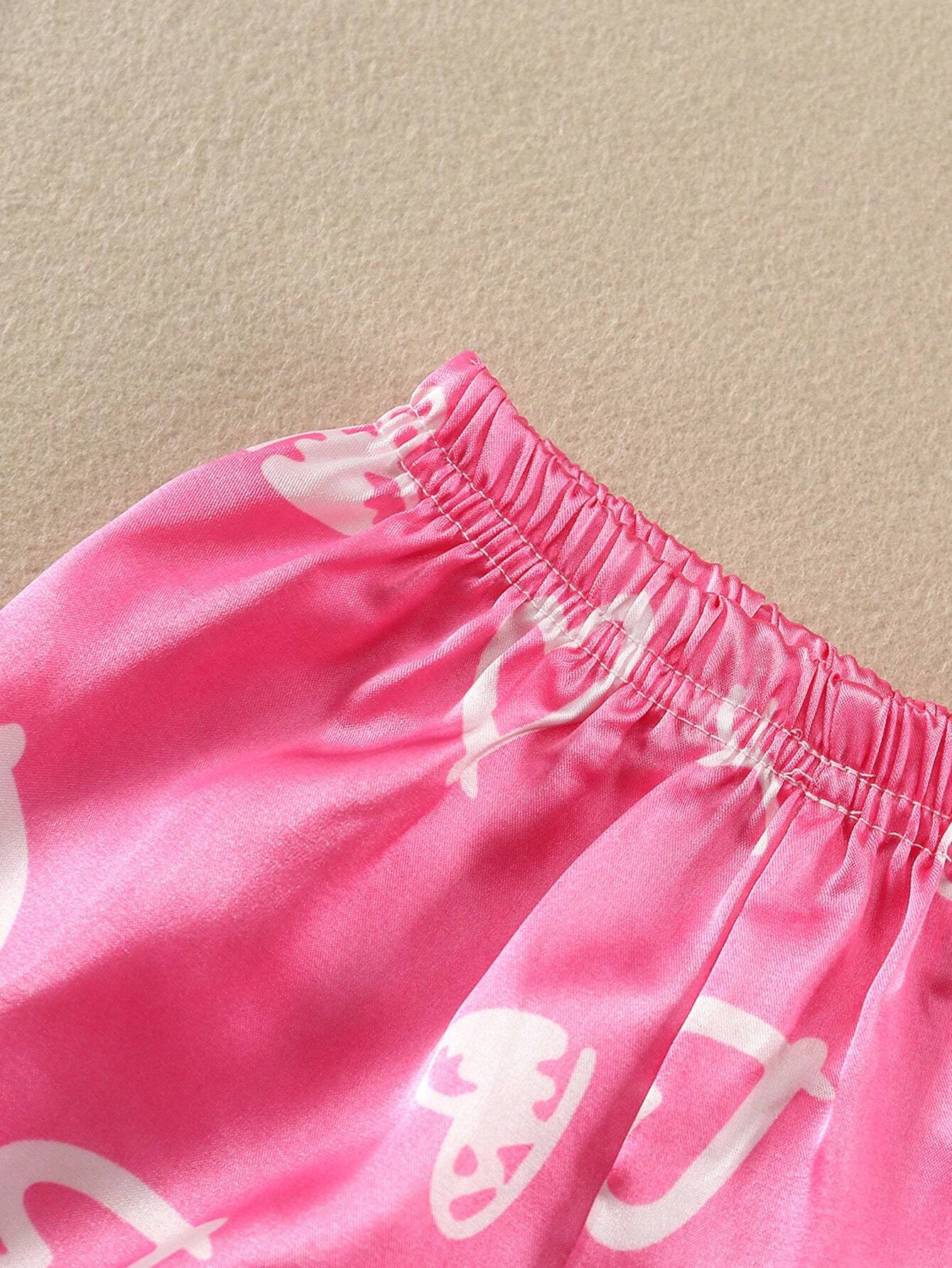 Prenda rosa pijama de satén para bebe detalle cintura elástica pantalón corto