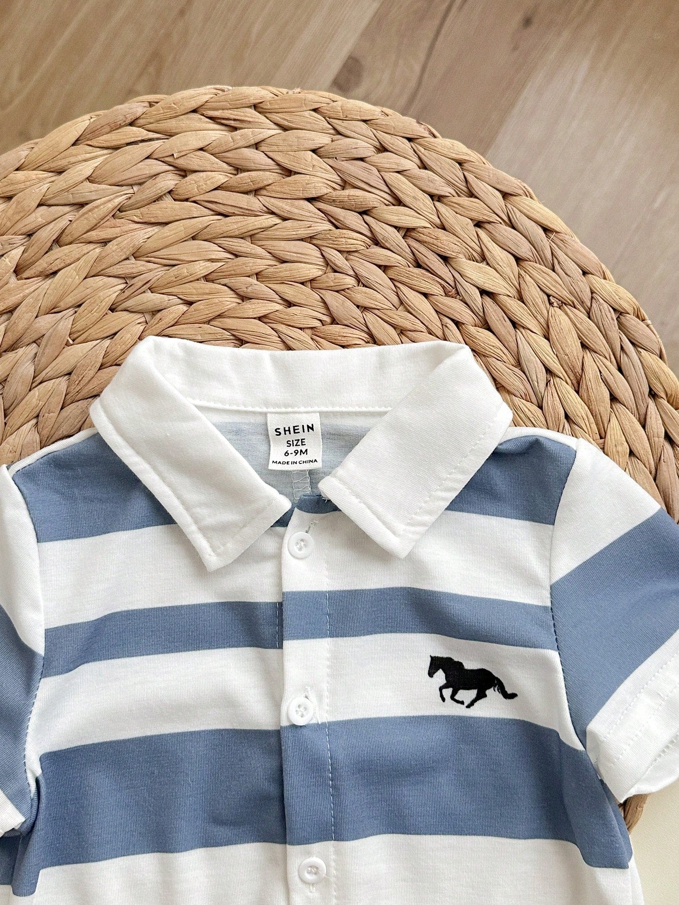 Mameluco azul y blanco rayas cuello polo
