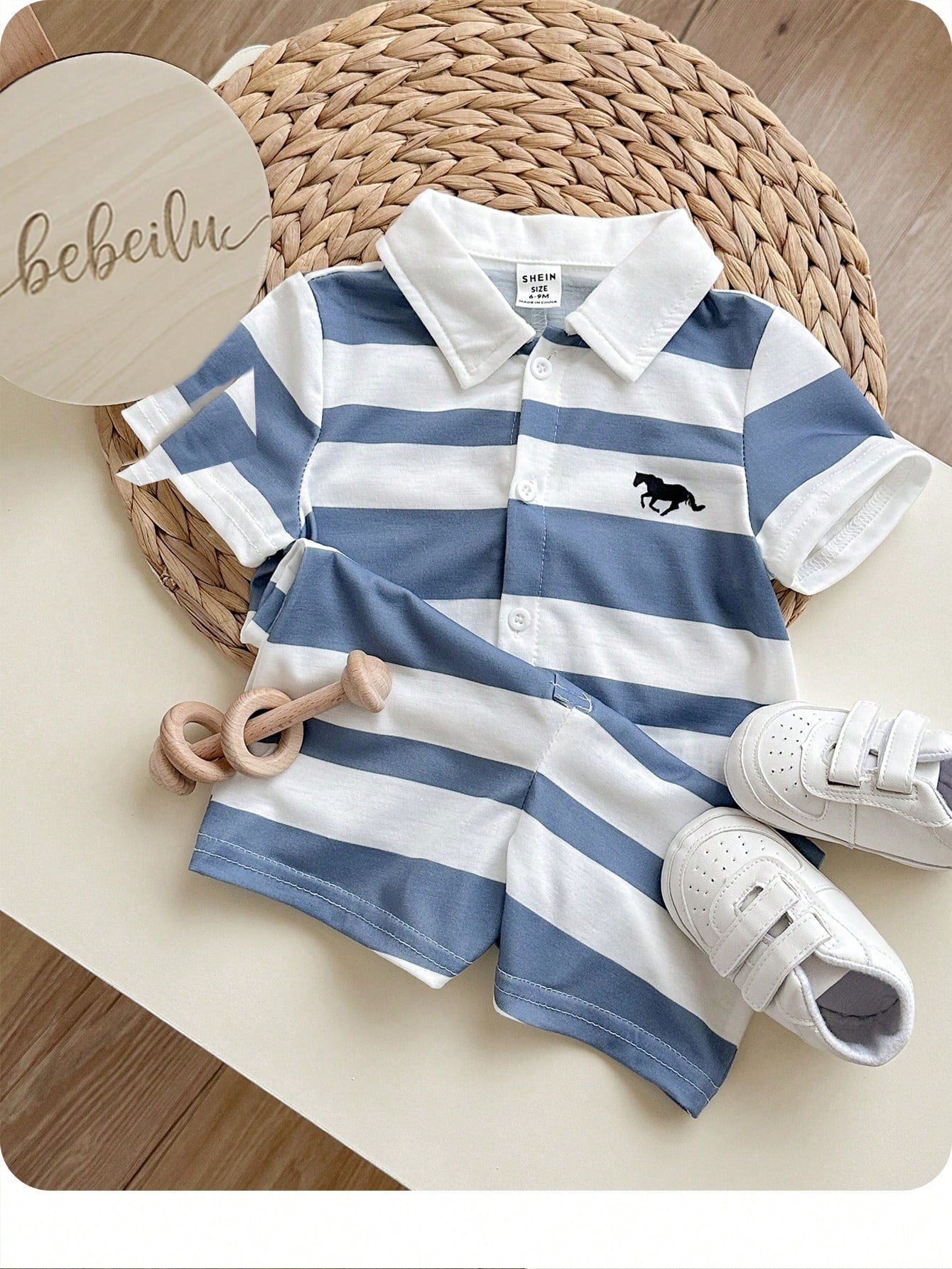 Mameluco azul y blanco rayas cuello polo