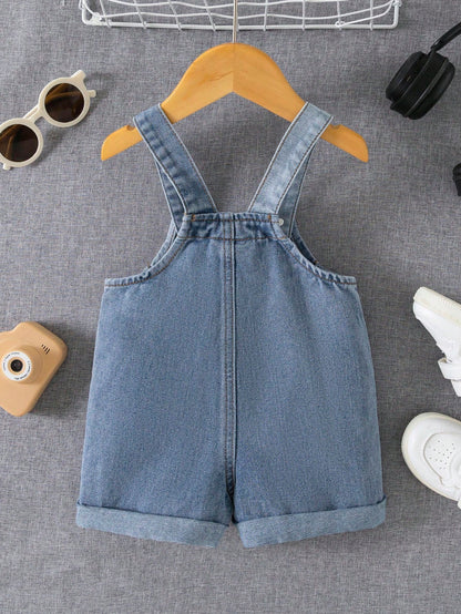 Prenda azul overol de mezclilla para bebe vista trasera