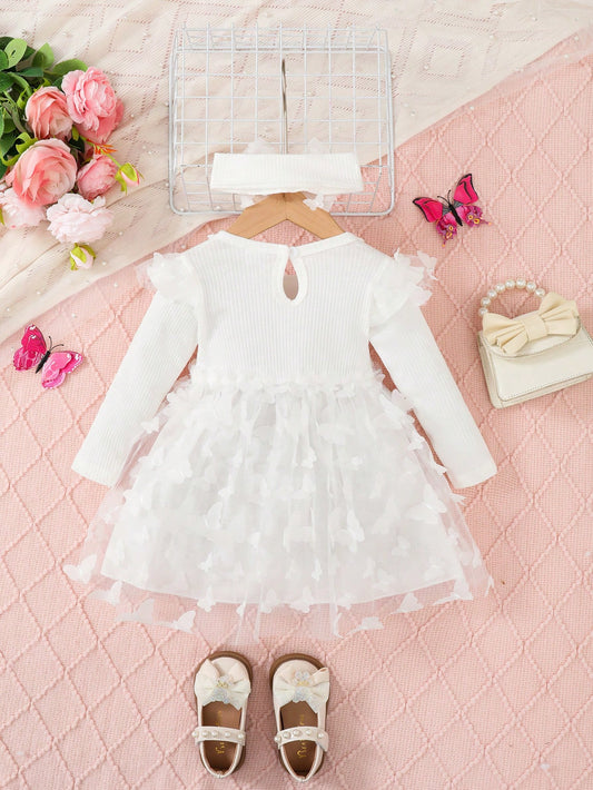 Vestido blanco de tul con mariposas y cuello volante