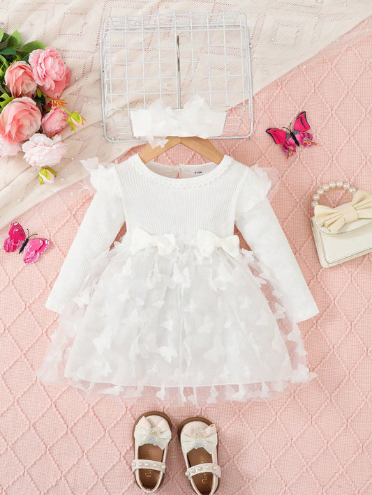 Vestido blanco de tul con mariposas y cuello volante
