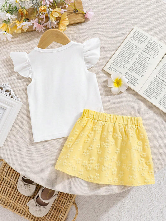 Conjunto blanco y amarillo para bebé niña con falda floral