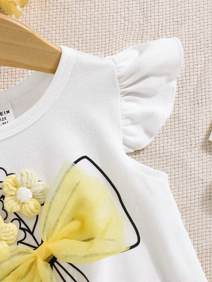 Conjunto blanco y amarillo para bebé niña con falda floral