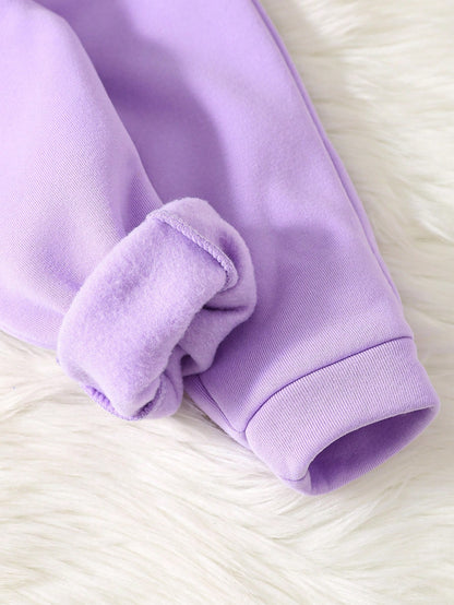 Conjunto morado floral para niña con tela afelpada