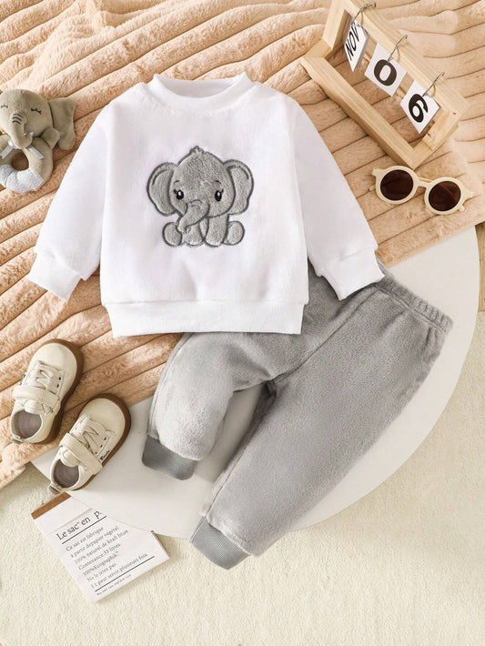 Prenda gris conjunto de pelito para bebe con elefante bordado vista frontal
