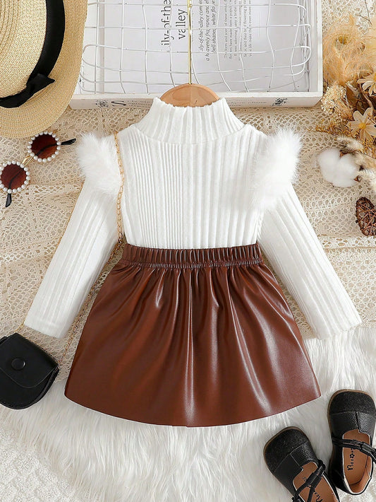 Prenda blanca conjunto para bebe con falda café plisada vista posterior